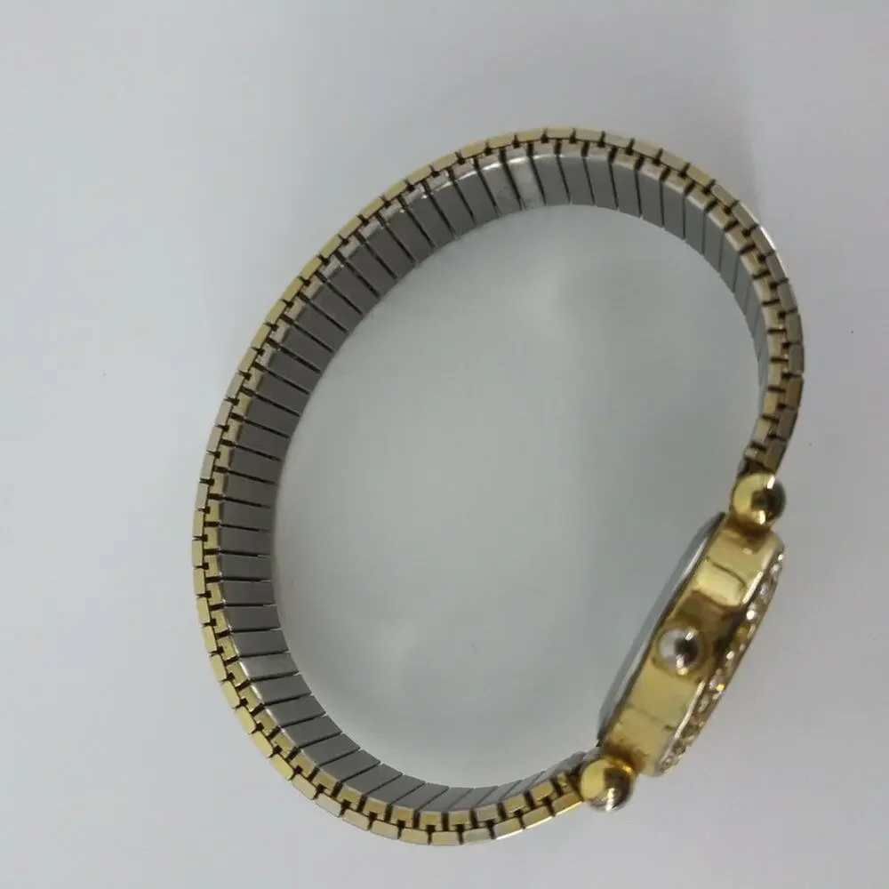 Vintage Milan Womens Gold Tone Stretch Bracelet Wristwatch with Rhinestones